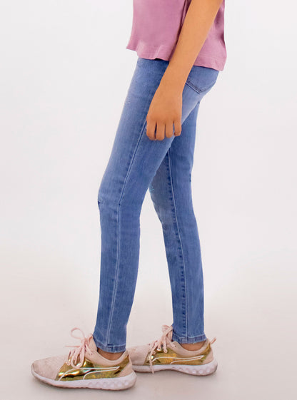 Jeans skinny con bordado de estrellas