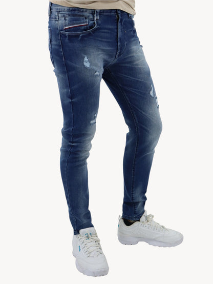 Jeans skinny de color azul oscuro con destrucción (NUEVA TEMPORADA)