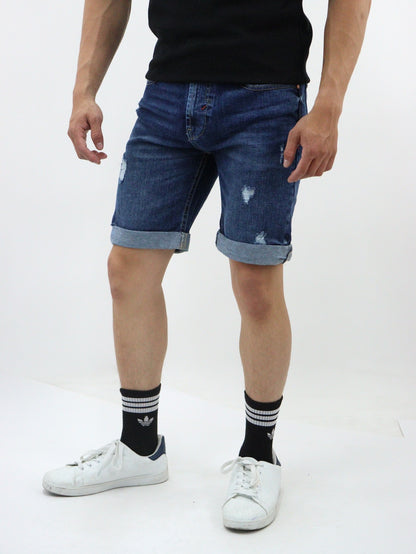 Short de mezclilla color azul oscuro con destrucción