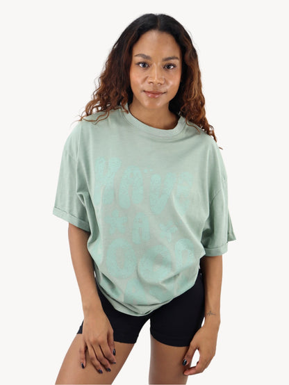 Playera oversize de color verde con estampado (NUEVA TEMPORADA)