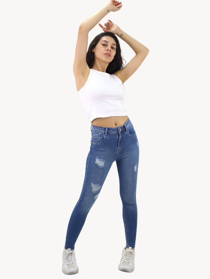 Jeans skinny de color azul medio con destrucción (NUEVA TEMPORADA)