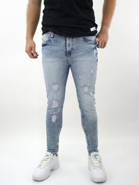 Jeans skinny de color azul claro deslavado con tinta (NUEVA TEMPORADA)