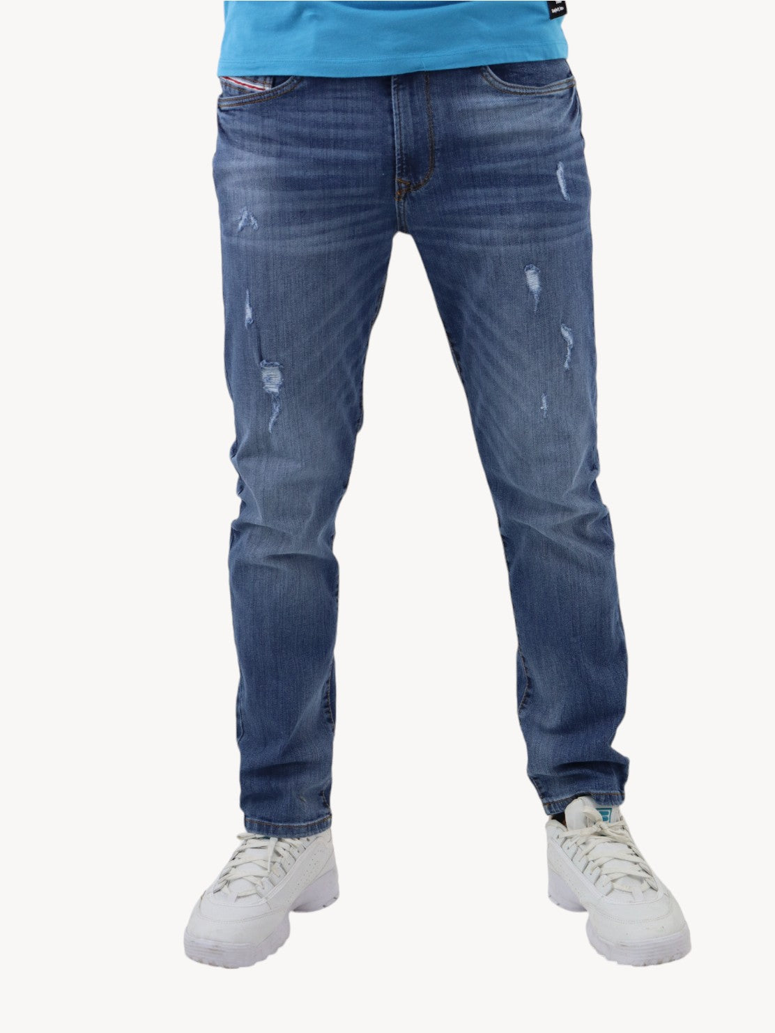 Jeans skinny de color azul medio con destrucción (NUEVA TEMPORADA)